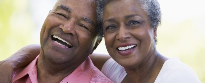 happy Senior couple sitting outdoors