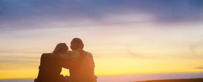 end of life planning Couple on evening sky background