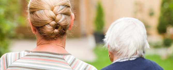 the cost of caring for an elderly parent older woman walking with her elderly mother