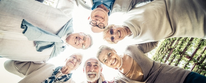 voice of the CCRC resident group of happy older people standing in a circle