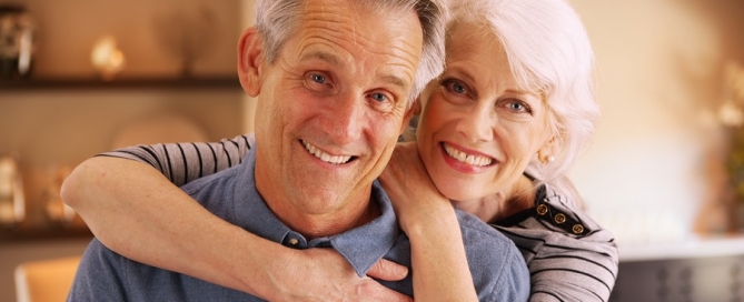 attracting younger retirees older couple embracing