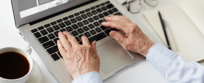 encore career older person using a laptop