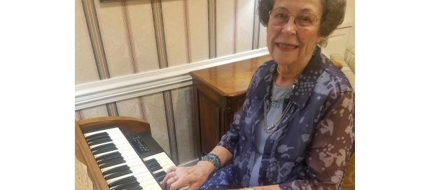 senior woman playing the organ