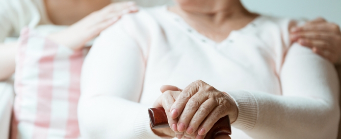 the old disease older woman with younger woman's arm around her