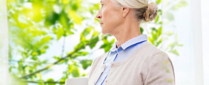 gap in senior care woman holding a coffee cup