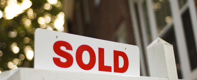 real estate sold sign