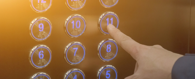 pressing the elevator up and keypad elevator