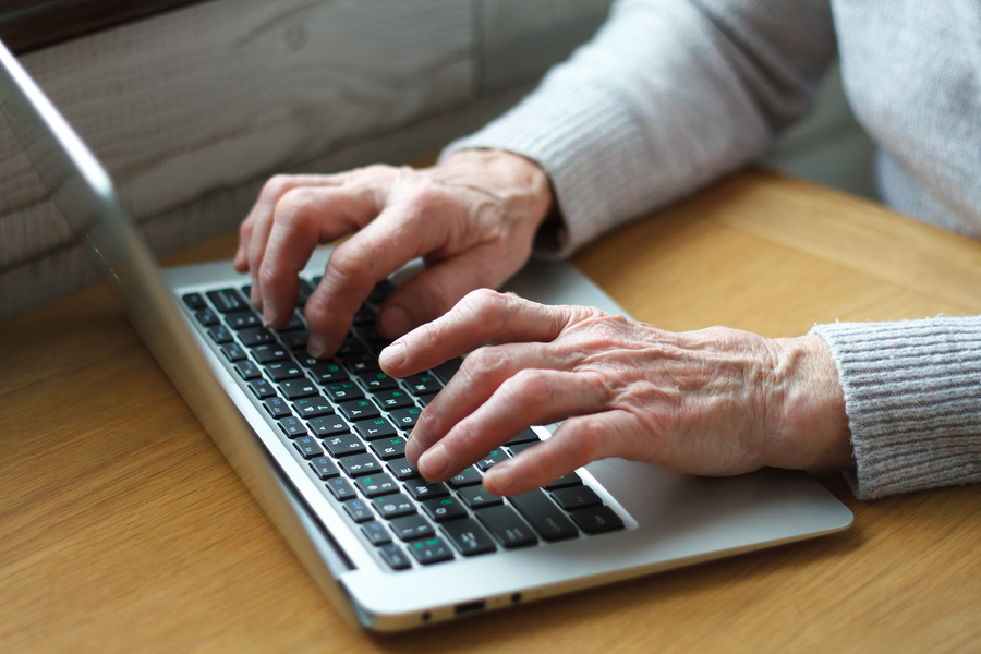 Perspectives on the Future of CCRCs Mature female hands typing text on keyboard