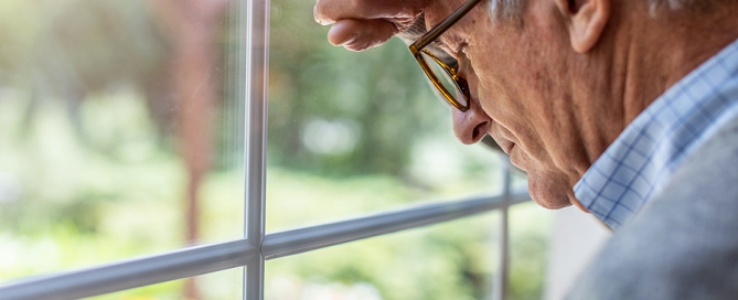 Depressed senior man in isolation at home senior anxiety