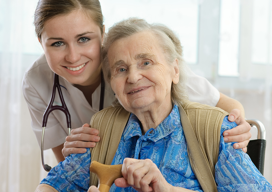Senior woman and her doctor or caregiver ; Medicare-Certified Senior Care Center
