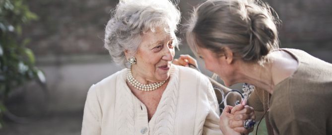 care decisions ; senior woman talking to adult child; later retirement years