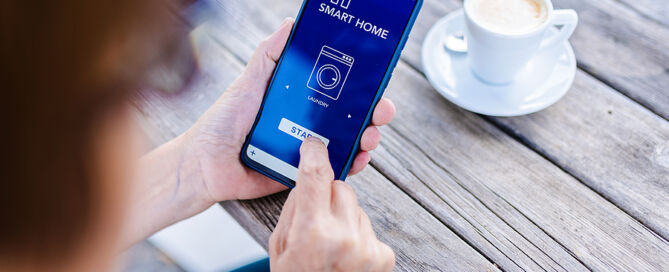 Senior Woman Using Smart Home Iot App Control On Mobile Phone smart aging technology