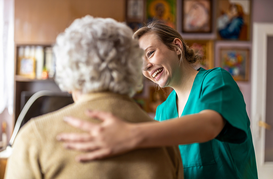 How Long Will I Need Long-Term Care Friendly nurse supporting an elderly lady