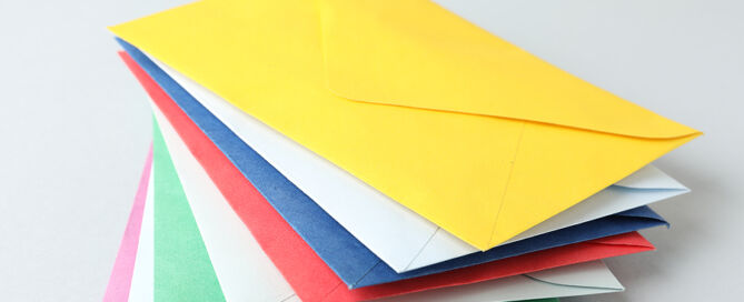Stack Of Colorful Envelopes senior living direct mail