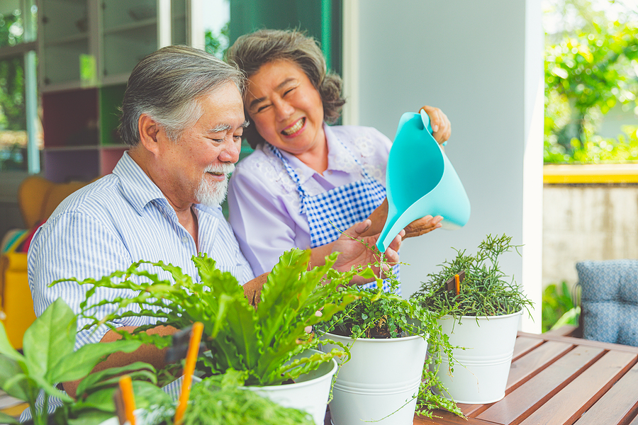 Elderly Couple Smiling equity retirement communities