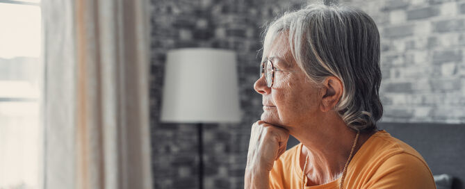 Face Of Senior Woman Looking Away senior loneliness