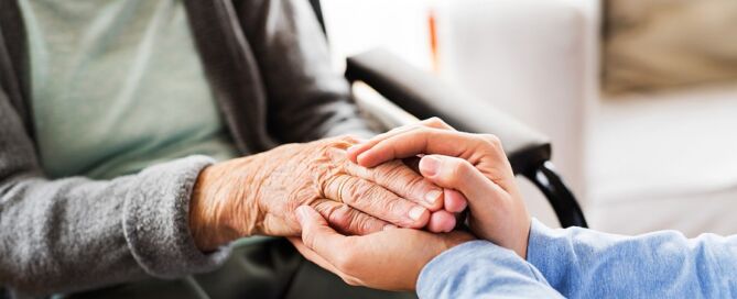 health visitor and a senior woman during nursing home visit long-term care Ombudsman Programs