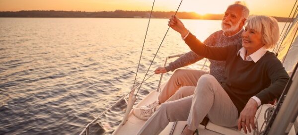 couple on yacht; luxury senior living; luxury retirement communities