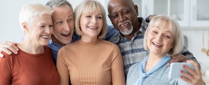 Five,Cheerful,Elderly,People,Taking,Selfie,On,Mobile,Phone,,Happy; 55+ communities; 55+; HOPA; 55+ community