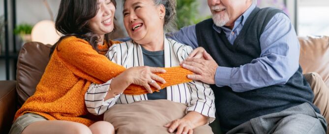 Candid,Of,Daughter,Hug,Mother,Father Independent Living and Active Adult Community