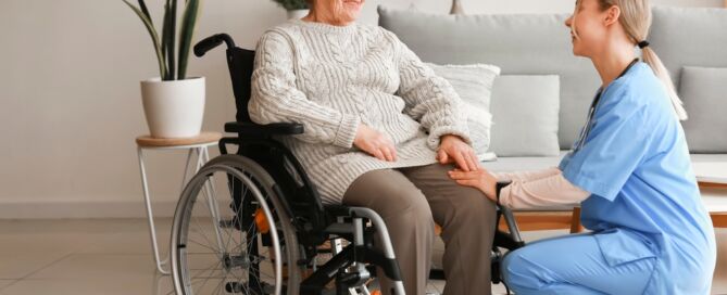 Paid Caregiver,With,Senior,Woman,In,Wheelchair,At,Home; Collaboration Between Paid Caregivers Family